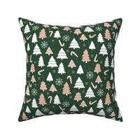 Boho christmas trees candy and snow flakes in caramel white on dark green