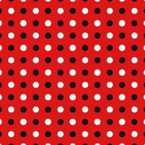 black and cream polka dots on red