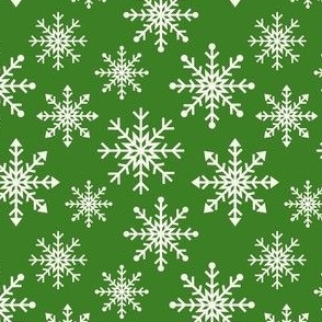 cream snowflakes on green