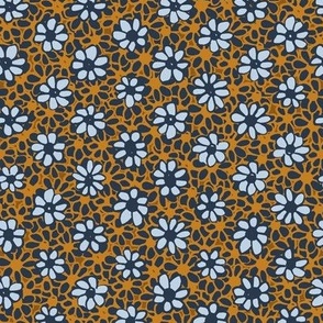 373 $ Medium scale Batik Style Cottage Garden Daisies in Navy Blue, Caramel and Golden Mustard: for ethnic garden  wallpaper, duvet covers and table linen.
