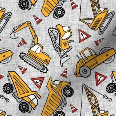 Small Scale / Construction Cars / Tossed / Light Grey Textured Background 