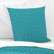 small sleigh in blue on teal