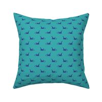 small sleigh in blue on teal