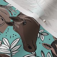 Wild horses freehand illustrated leaves and sweet horse faces girls dream ranch theme kids soft blue brown on white