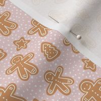 Little Christmas cookies and gingerbread men in ginger cinnamon on coral pink blush SMALL