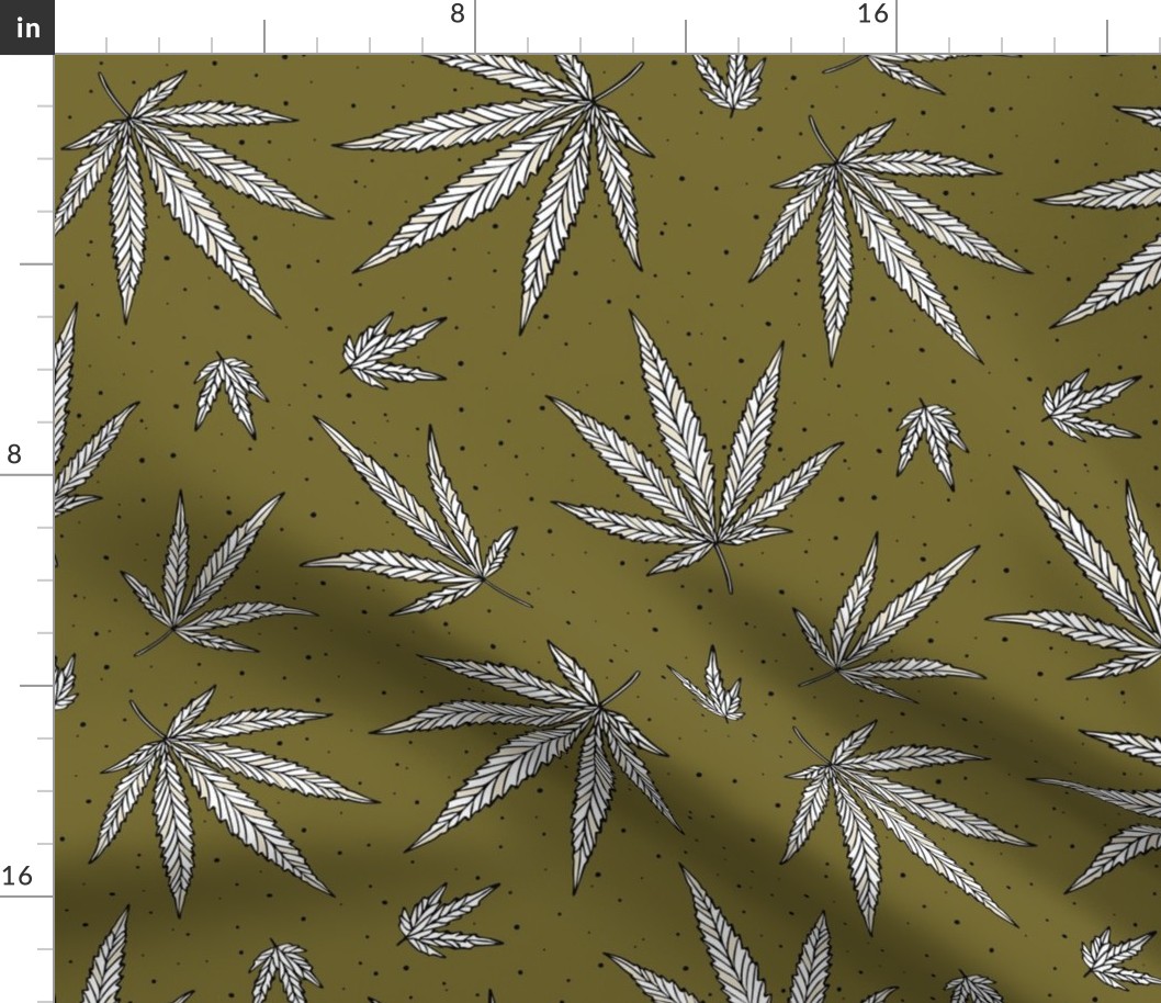 #212 Cannabis leaves on green background
