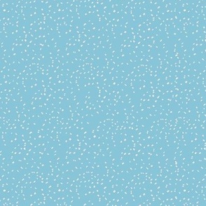 Speckled texture repeat design in aqua blue and light blue