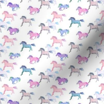 Ponies running in pastel pink, blue and lilac