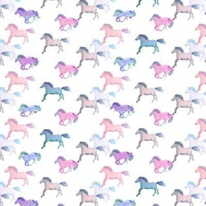 Ponies running in pastel pink, blue and lilac