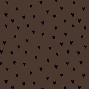 The minimalist hearts sweet lovers design for valentines day freehand drawn heart shapes on chocolate brown 