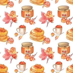 Cloudberry jam and pancakes on white