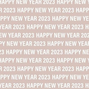 Happy new year 2023 text design basic typography design white on beige sand