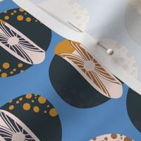 Morning Medley: Abstract Design with Dark Blue and Tan Circles on Sky Blue