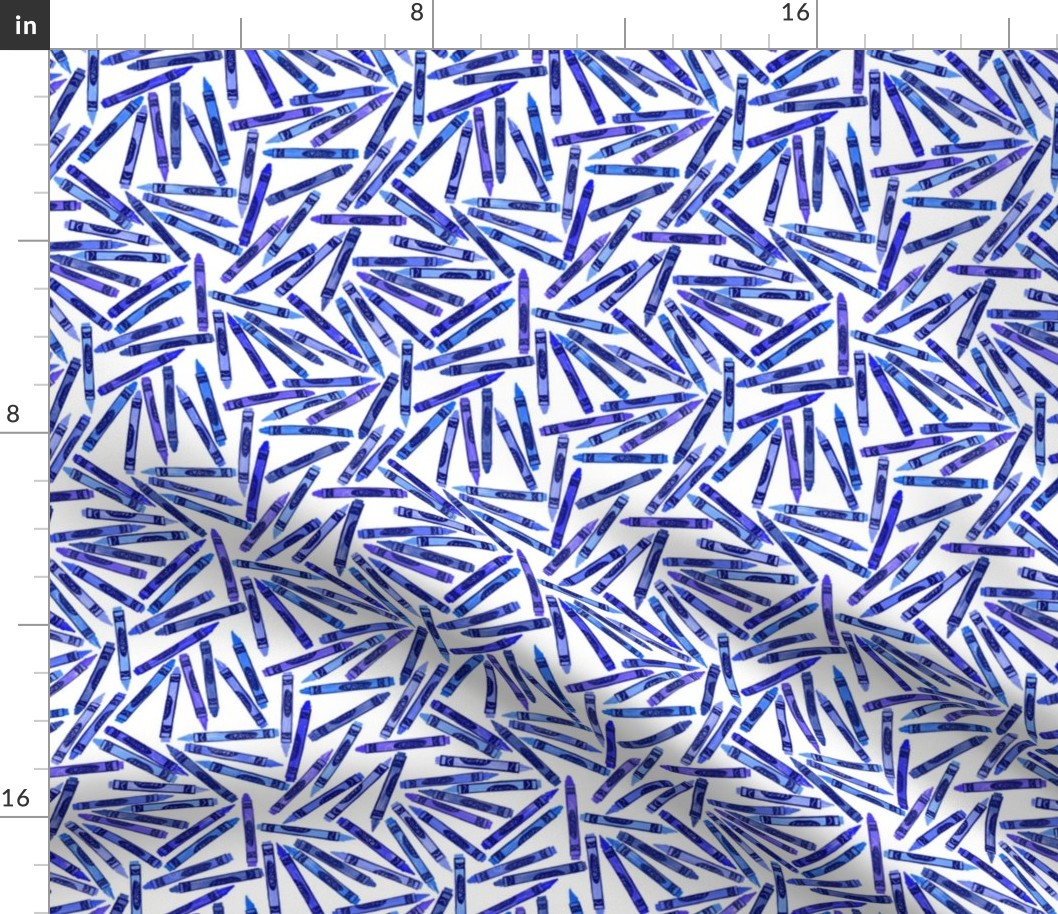 tiny blue crayons on white