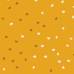 large // scattered hearts on yellow mustard ochre