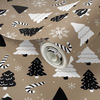 Boho christmas trees candy and snow flakes in white black on latte brown beige