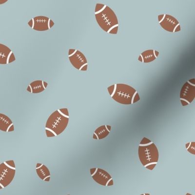 American football minimalist sports design in brown leather on moody blue