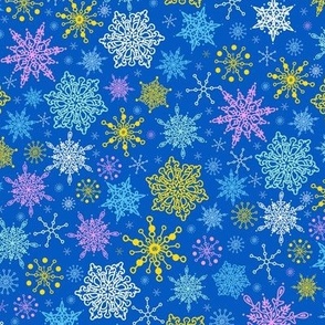 Colorful snowflakes on blue fabric design repeat pattern