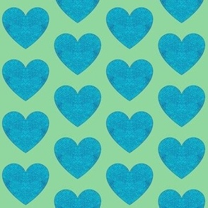 Mosaic hearts on green