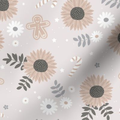 Boho sunflower gingerbread and candy canes Christmas design with daisies and leaves stars and snow beige sand gray neutral