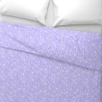 Light purple field flowers fabric design repeat pattern