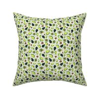 Small Scale Green Avocados Pits and Slices with Playful Polkadots on Ivory