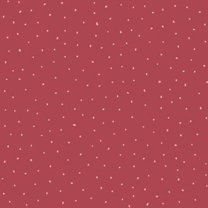 Pink dots on red