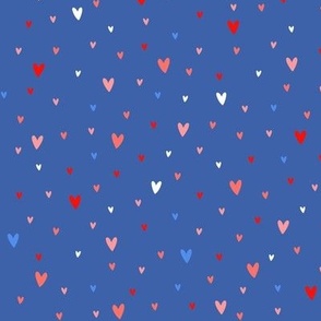 Fourth of July hearts on blue
