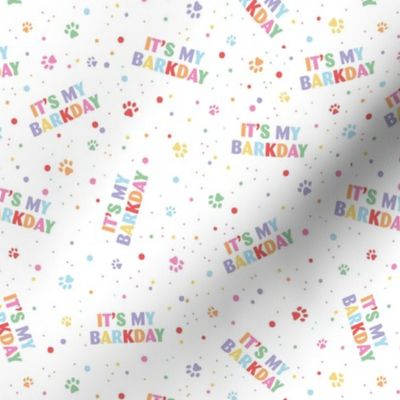 Colorful rainbow barkday design with confetti paws and happy birthday text for dogs on white 
