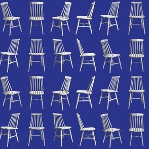Small Mid Century Chairs on Bright Blue