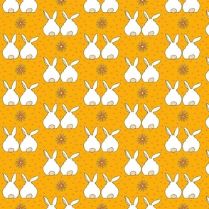 white rabbit friends on marigold background