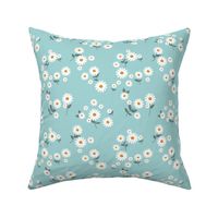 Messy daisies and leaves spring summer garden petals and blossom flowers white gray on blue