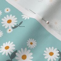 Messy daisies and leaves spring summer garden petals and blossom flowers white gray on blue