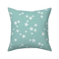 The minimalist hawaii blossom garden jasmin flowers and seeds white on warm aqua blue