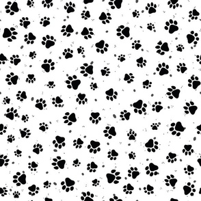 Abstract black and white cat paw pattern with dots
