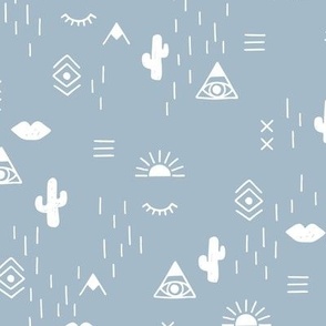 Western freehand sunrise with mountains aztec details cacti and indian summer elements white on cool blue