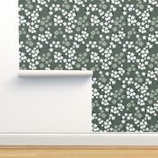 Hawaii garden field of flowers jasmin and orchid blossom boho nursery white sage green on olive gray