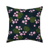 Monstera leaves and palm petals with tropical flowers hawaii island vibes boho design garden pink green on deep navy blue night