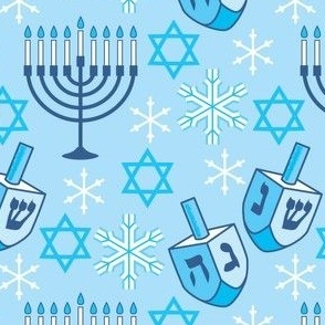 hanukkah designs and snowflakes on blue