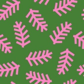 Pink Christmas tree branches on green