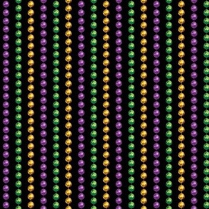Mardi Gras Beads in Rows on Black