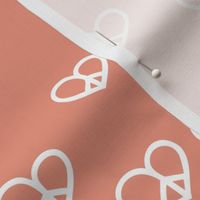 Fat love and peace minimalist freehand boho hearts hippies sign white on moody rose peach apricot seventies vintage
