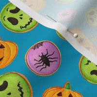 Medium Scale Trick or Treat Halloween Cookies Pumpkins Spiders Monsters on Caribbean Blue