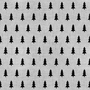 small black pine trees on natural linen