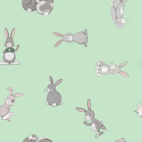 Bunnies scattered on light green