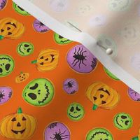 Small Scale Trick or Treat Halloween Cookies Pumpkins Spiders Monsters on Carrot Orange