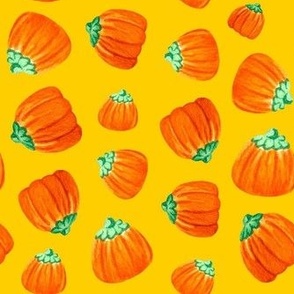 Medium Scale Halloween Candy Orange Mellowcreme Pumpkins Trick or Treat Candies on Golden Yellow