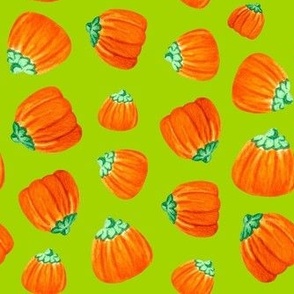 Medium Scale Halloween Candy Orange Mellowcreme Pumpkins Trick or Treat Candies on Lime Green