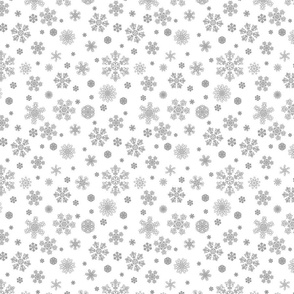 Silver snowflakes on white background