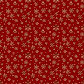 Golden snowflakes on red background